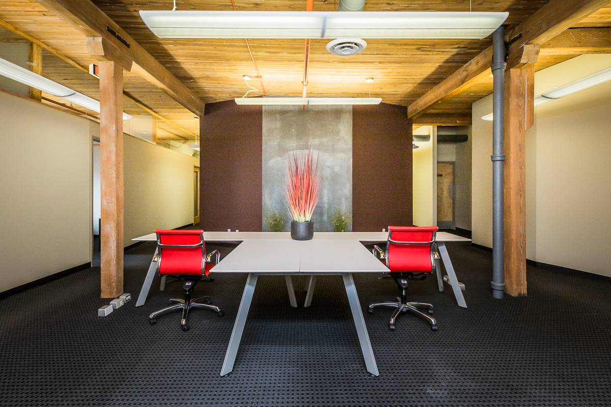 Contemporary workspace with wooden beams