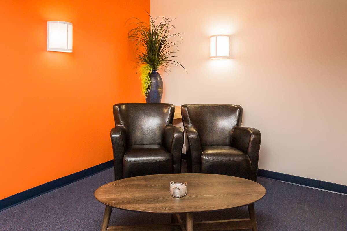Two leather chairs in modern office